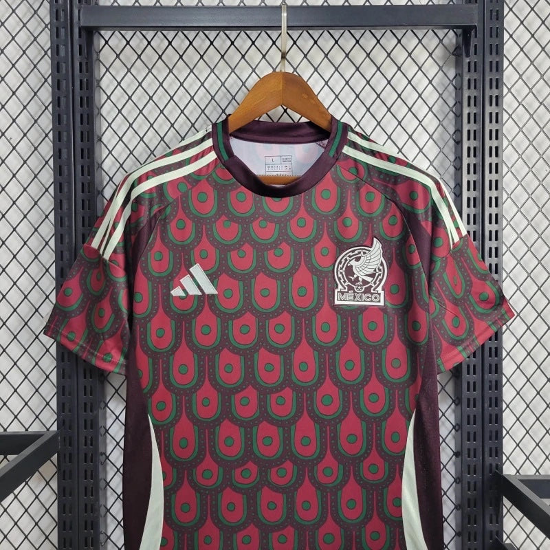 Leazofoot Mexico 2024 home soccer jersey featuring a maroon and green peacock-inspired pattern and team crest.