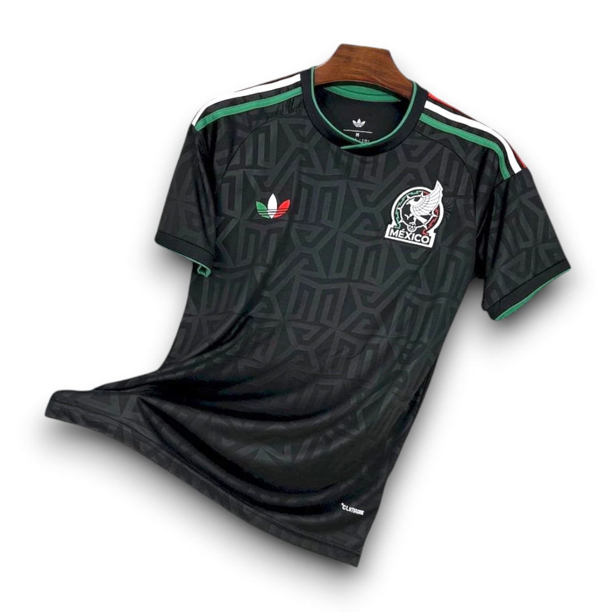 Leazofoot Mexico 2025 away soccer jersey in black with geometric pattern, green, white, and red shoulder stripes.