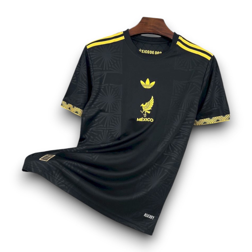 Leazofoot black Mexico 2025 concept soccer jersey with yellow accents, eagle graphic, and patterned fabric details.