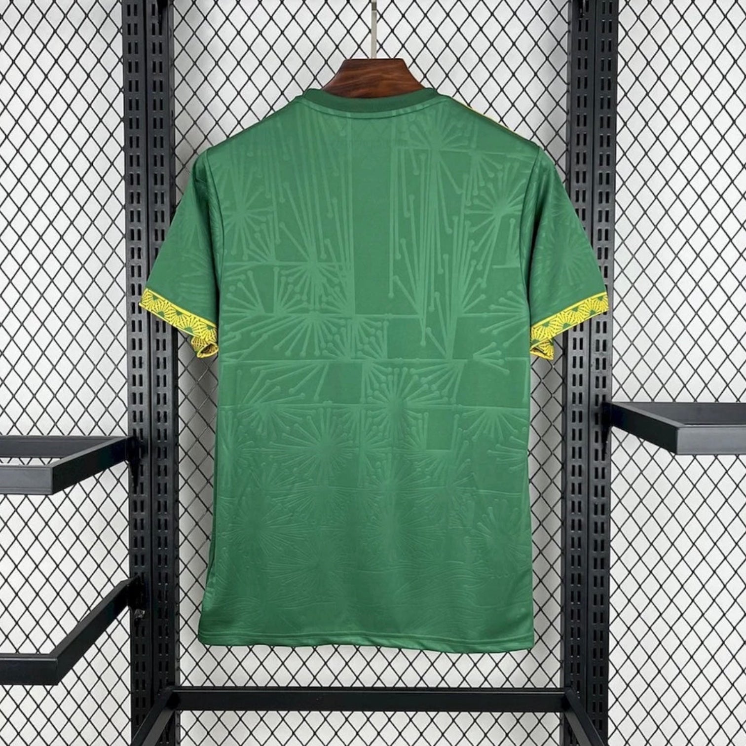 Leazofoot Mexico 2025 home soccer jersey in green with subtle geometric patterns and yellow patterned sleeve cuffs.