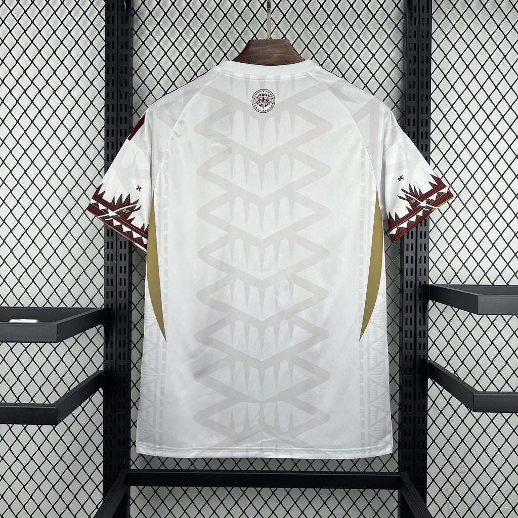 Leazofoot Mexico 26/27 concept soccer jersey in white with intricate cultural patterns and maroon sleeve details.