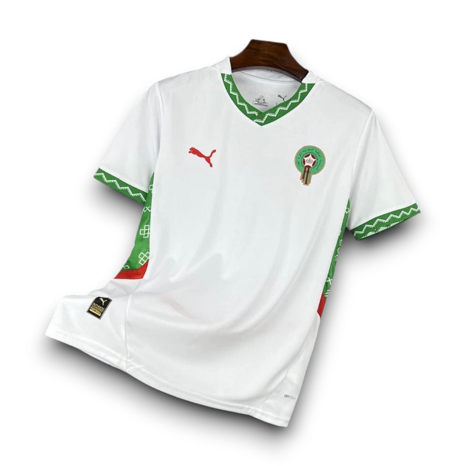Leazofoot Morocco 2025 away football jersey in white with green geometric trim and red Puma logo on a display rack.