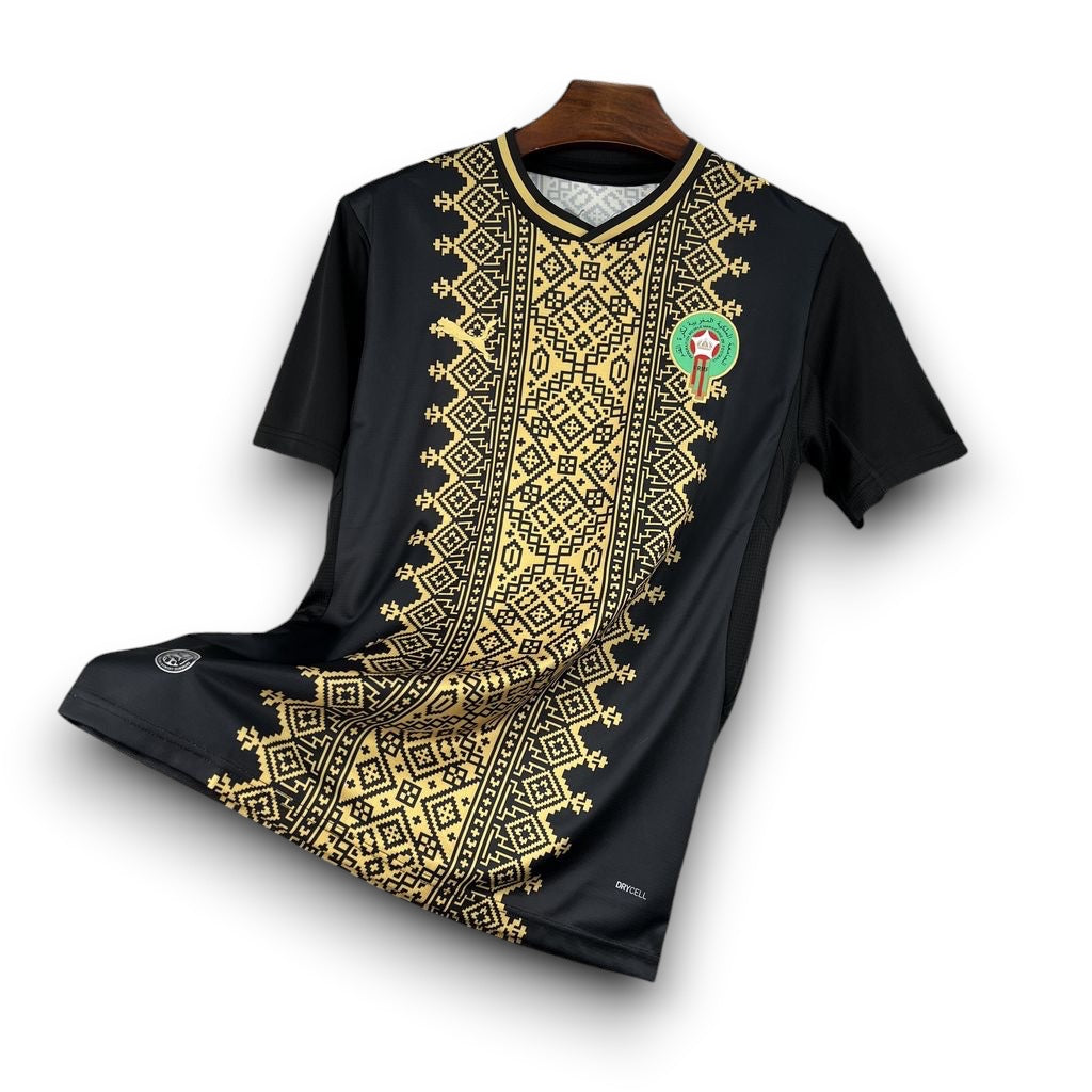 Leazofoot Morocco 2026 concept soccer jersey in black with gold traditional geometric patterns and team crest.
