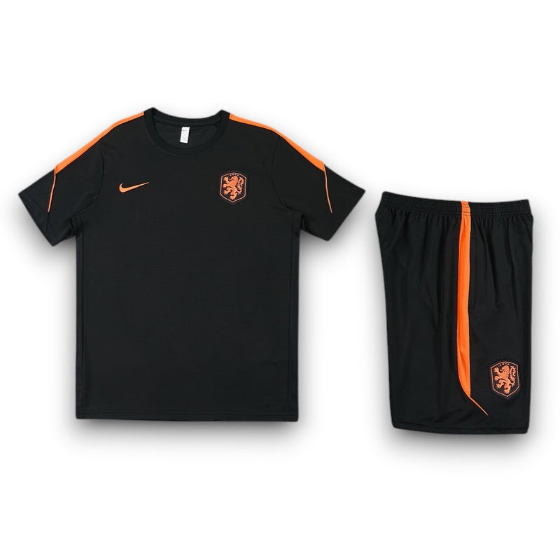 Leazofoot Netherlands 2026 training kit in black with orange accents, featuring a jersey and matching shorts.