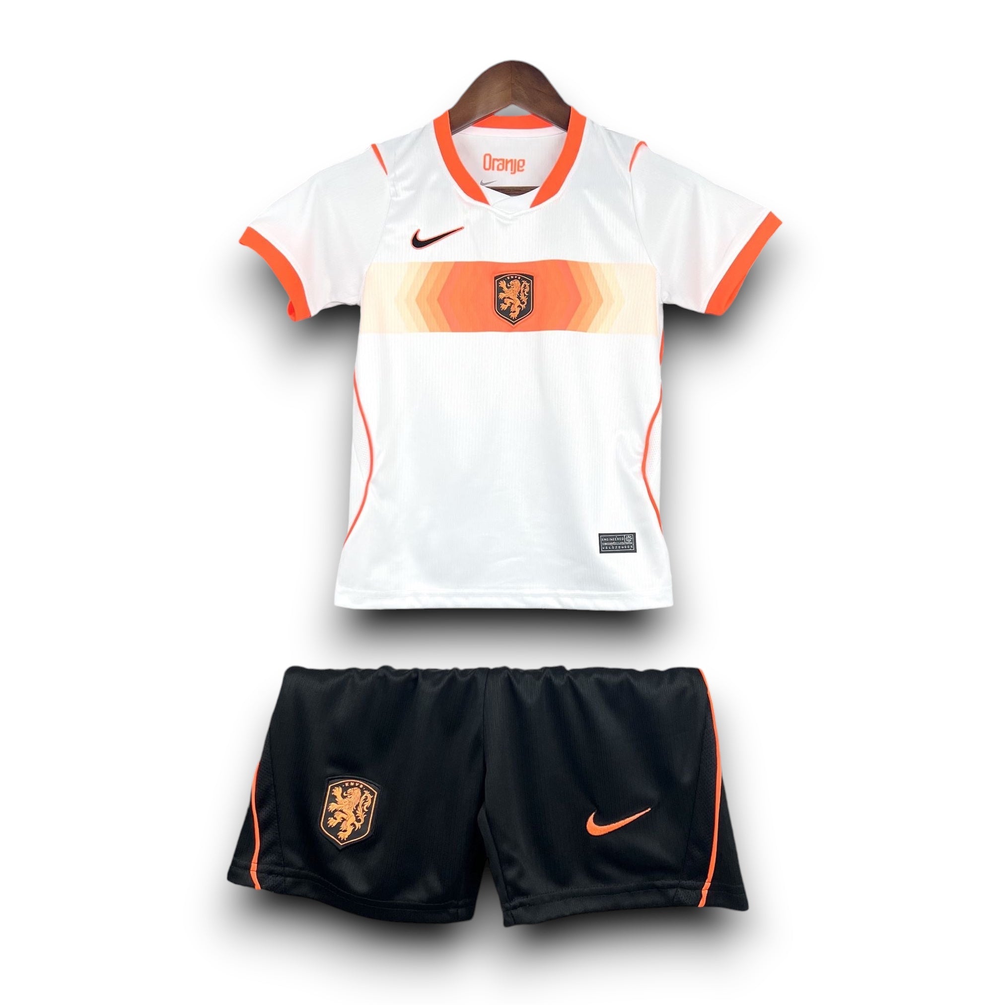Leazofoot white and orange Netherlands kids football kit with shorts and jersey featuring crests and Nike logo.