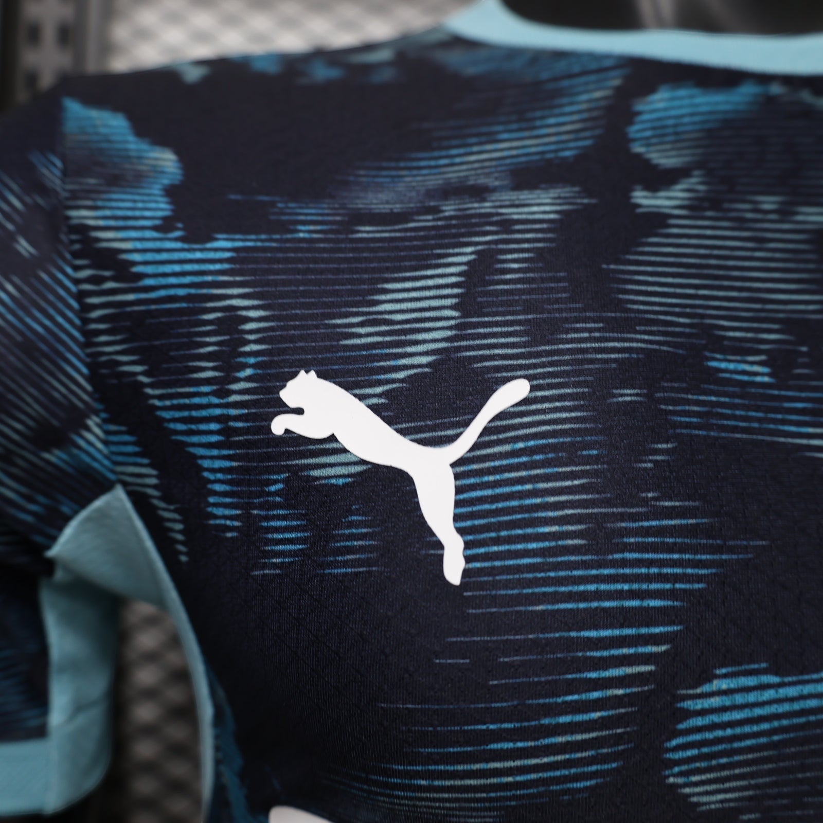 Leazofoot Olympique de Marseille 26/27 away jersey featuring a dark blue and teal abstract pattern with a white Puma logo