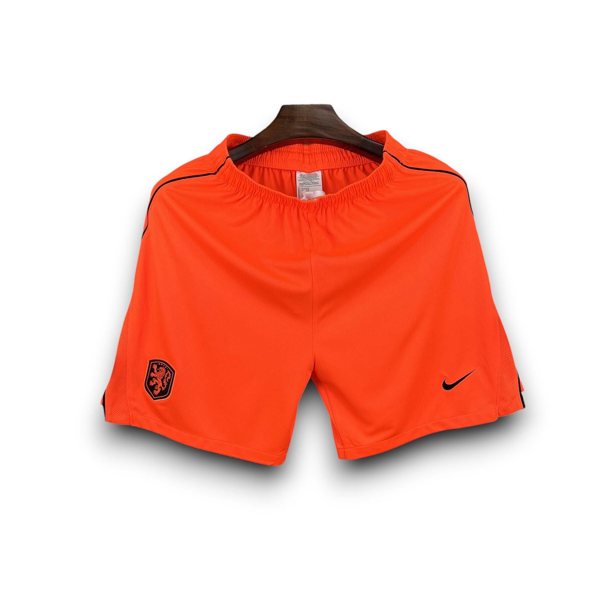Leazofoot orange soccer shorts with black trim and Netherlands crest. Nike logo on right leg.