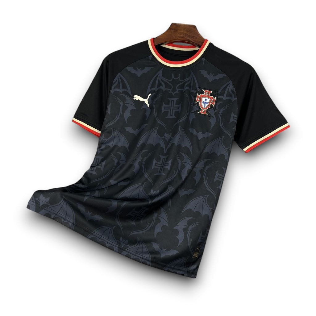 Leazofoot Portugal 2026 concept football jersey in black with a bat pattern, red and white trim, and team crest.