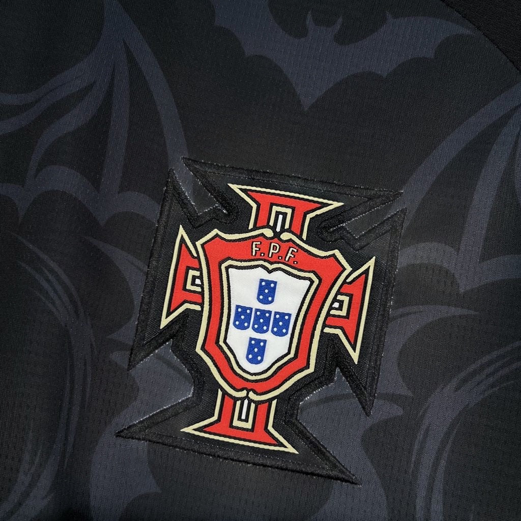 Leazofoot Portugal 2026 concept soccer jersey in black with a subtle bat pattern and embroidered FPF team crest.