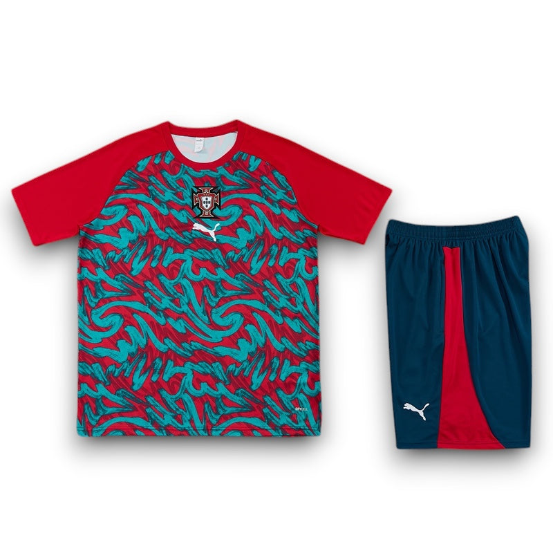 Leazofoot Portugal 2026 training kit featuring a red and teal patterned jersey and matching navy blue shorts.