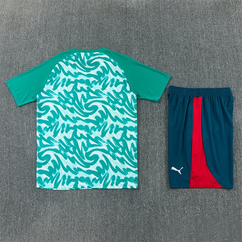 Leazofoot Portugal 2026 training set featuring a green and white swirl pattern jersey and teal shorts with red trim.