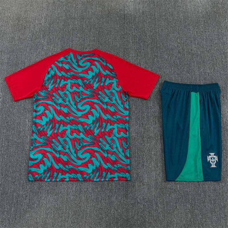 Leazofoot Portugal 2026 training set featuring a red and teal patterned jersey and matching teal shorts with team crest.