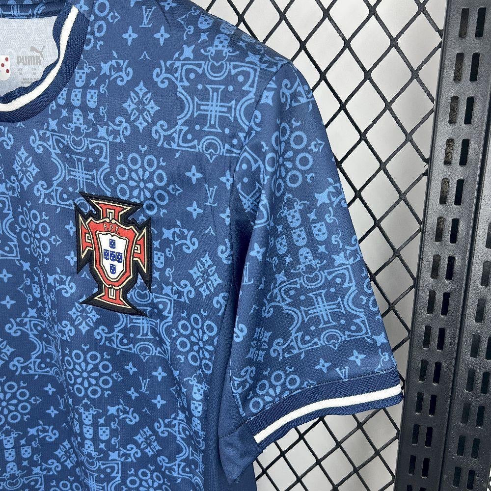 Leazofoot Portugal 2025 concept soccer jersey in navy blue with intricate patterned print and team crest.