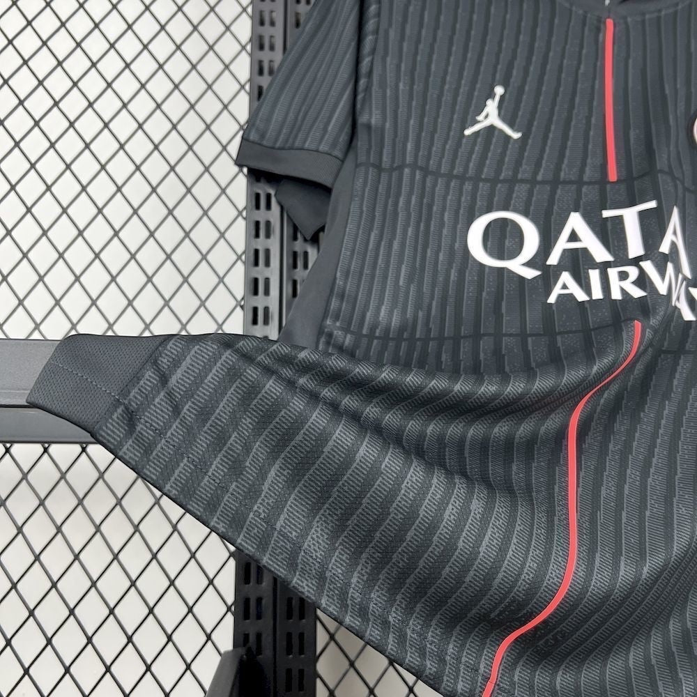 Leazofoot Paris Saint Germain 25/26 fourth jersey in black with vertical pinstripes and red accent detailing.