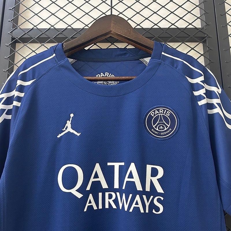 Leazofoot Paris Saint Germain 24/25 fourth football jersey in blue with Jordan logo and Qatar Airways sponsor print.