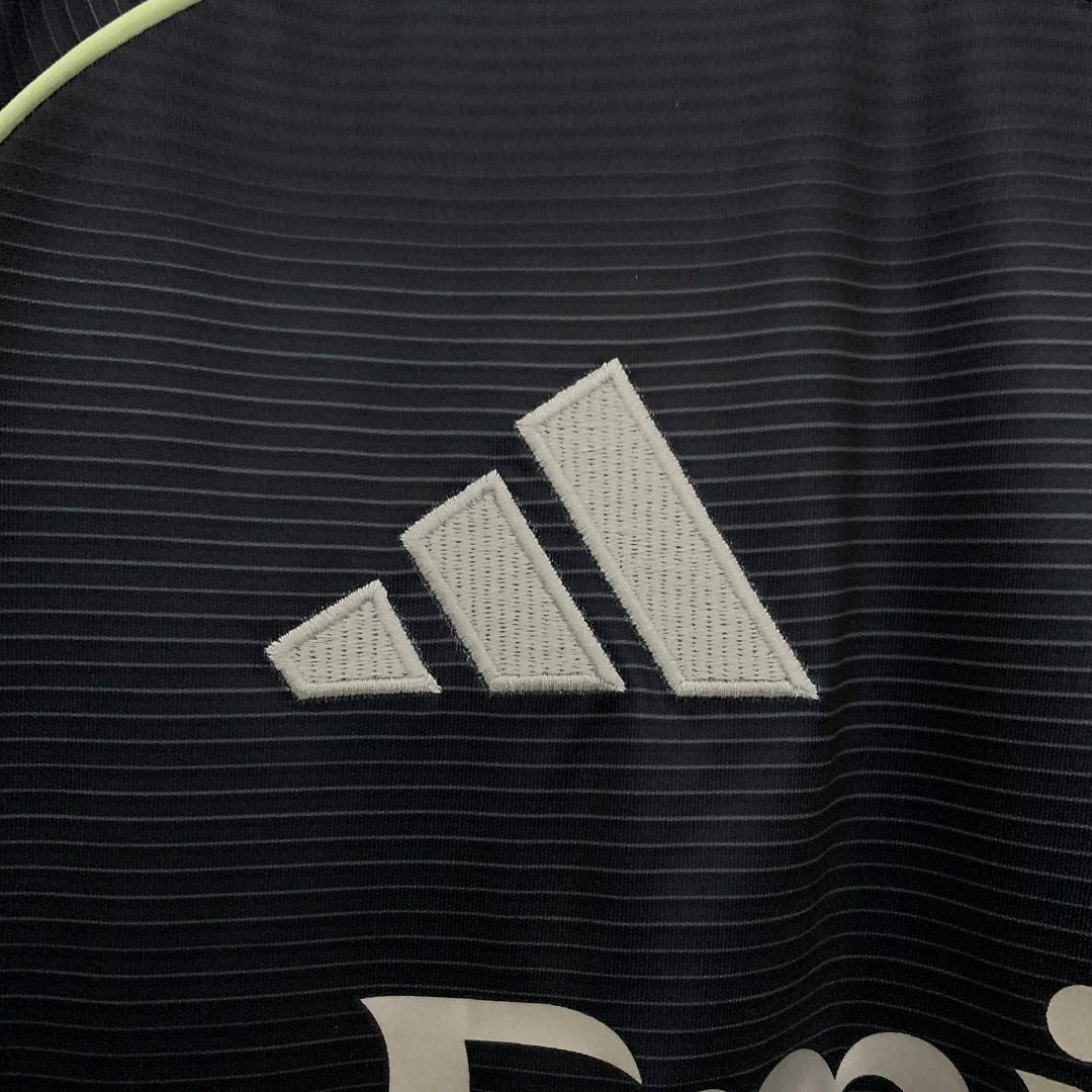 Leazofoot Real Madrid 25/26 away jersey featuring a black fabric with subtle horizontal stripes and white embroidered logo