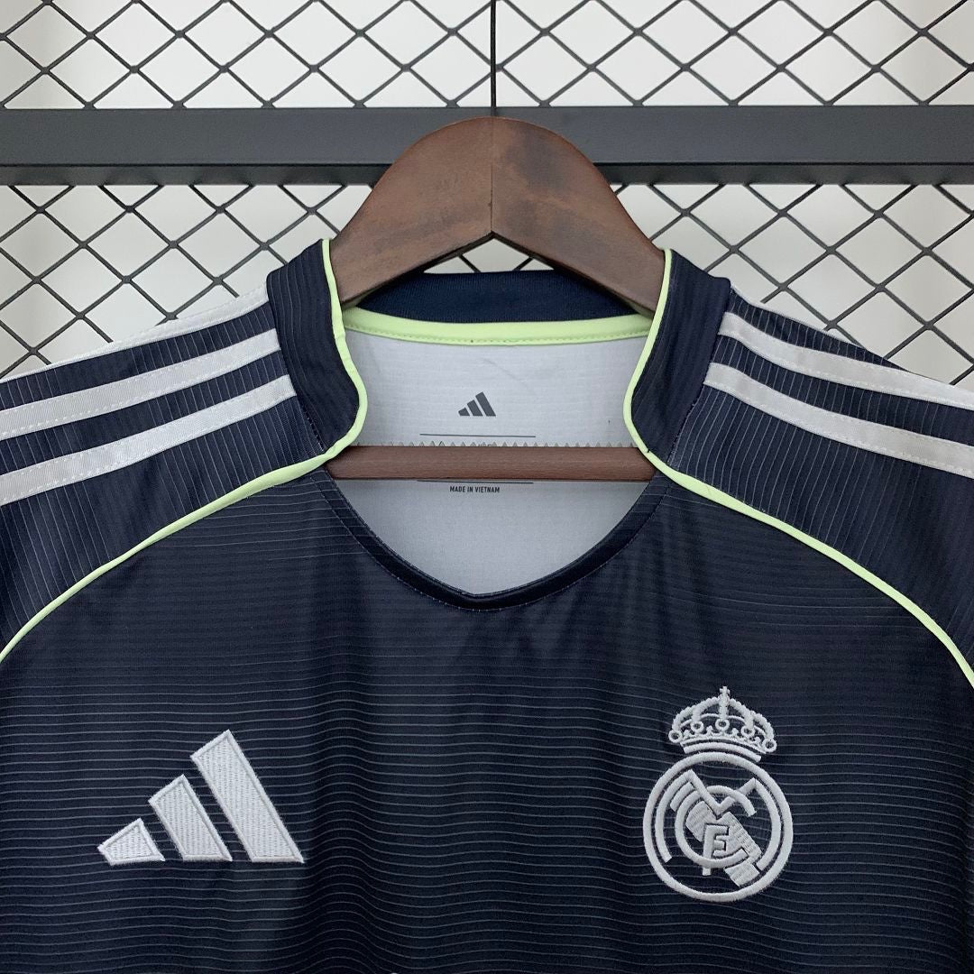 Leazofoot Real Madrid 25/26 away jersey in dark navy with white stripes and neon yellow trim details.