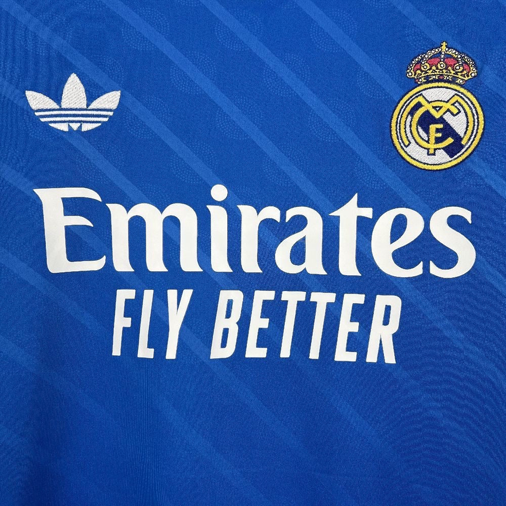 Leazofoot Real Madrid 25/26 third long sleeve jersey in blue with white Adidas logo and Emirates sponsor branding