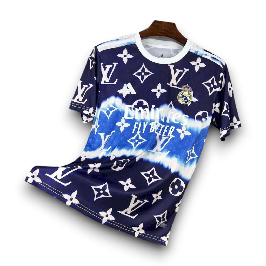 Leazofoot Real Madrid 25/26 concept jersey featuring a blue and white tie-dye pattern with luxury monogram print