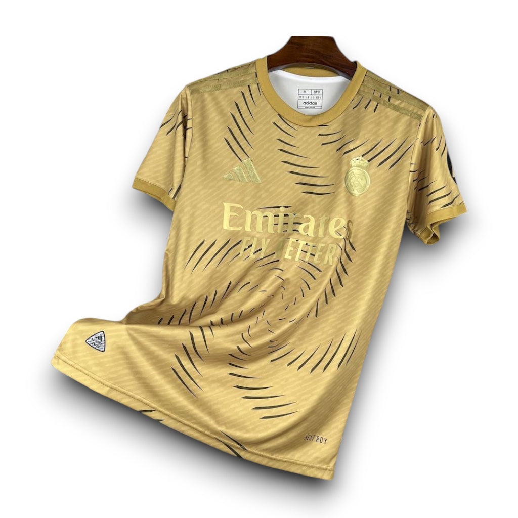 Leazofoot Real Madrid 2025-2026 concept gold football jersey with black abstract pattern and embroidered team crest
