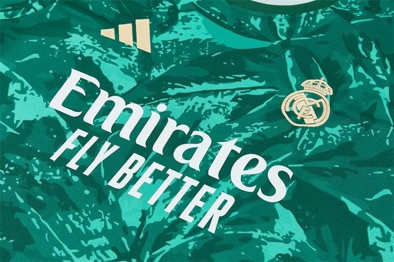 Leazofoot Real Madrid 2026 training jersey in green with abstract pattern, gold club crest, and sponsor logo.