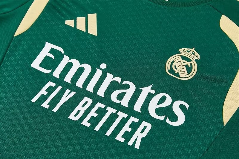 Leazofoot Real Madrid 2026 training jersey in dark green with gold accents and white Emirates Fly Better sponsor logo