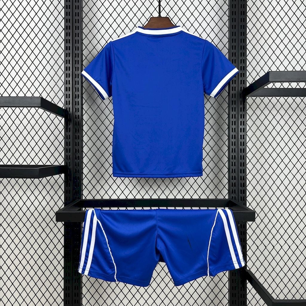 Leazofoot Real Madrid 2025-26 youth third kit in blue with white stripe details on shirt and shorts