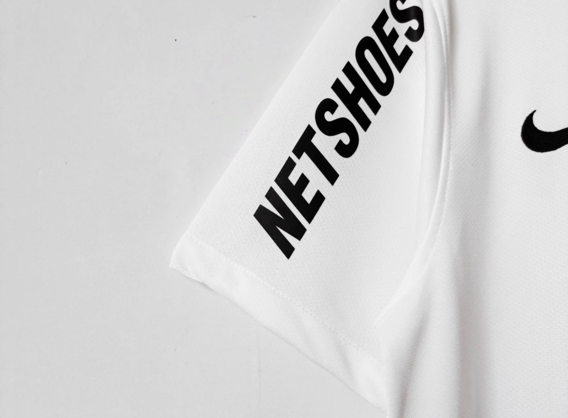 Leazofoot Santos 12/13 away jersey in white with black Netshoes branding on the sleeve and Nike logo.