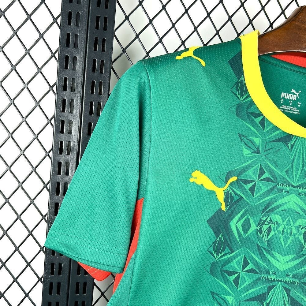 Leazofoot Senegal 2026 away football jersey in green with yellow Puma logo and geometric pattern details.