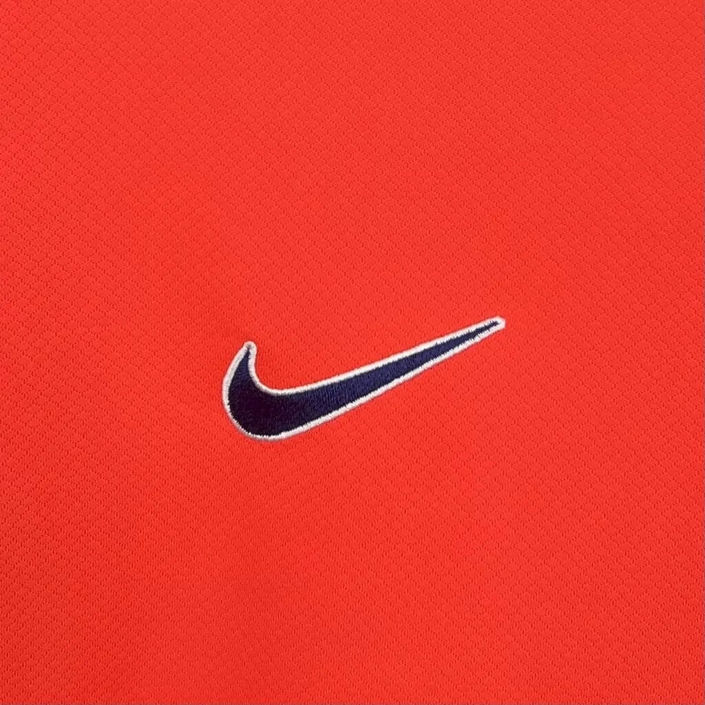 Leazofoot South Korea 2026 home jersey in vibrant red with a navy blue Nike swoosh logo.