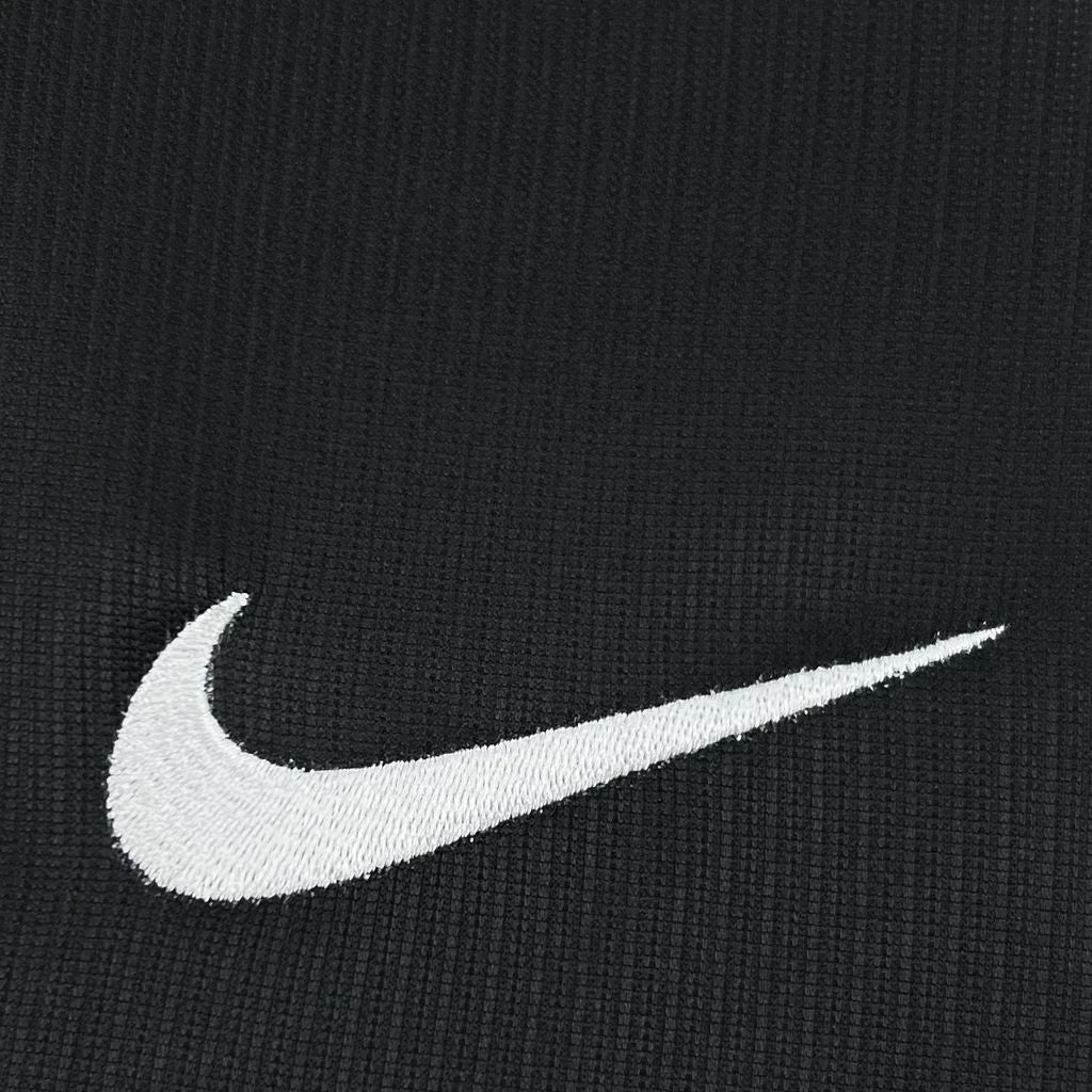 Leazofoot South Korea 2026 pre-match jersey featuring a white embroidered Nike swoosh on black textured fabric.