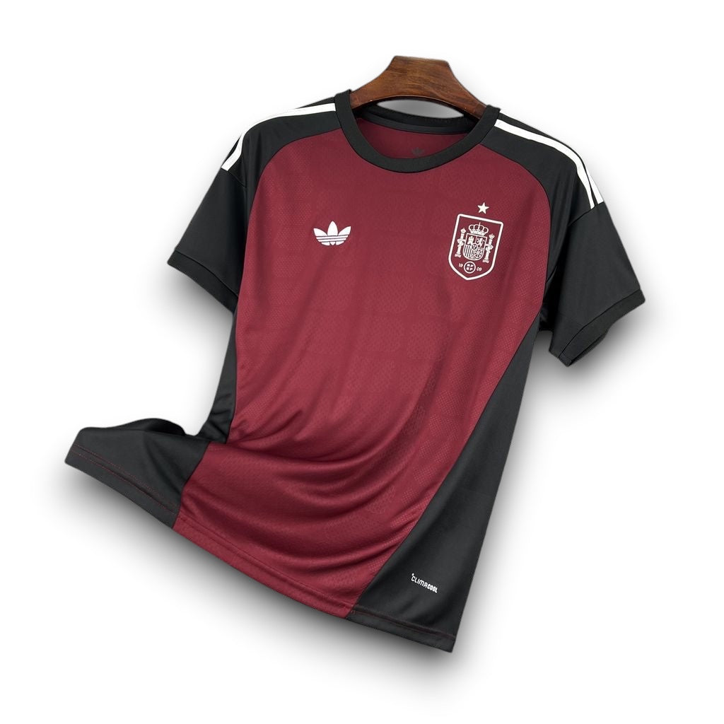 Leazofoot Spain 2026 goalkeeper jersey in burgundy and black with white adidas logo and Spanish national team crest.
