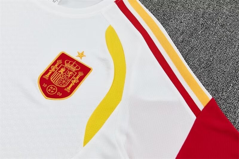 Leazofoot Spain 2026 training jersey in white with red and yellow accents and the official team crest