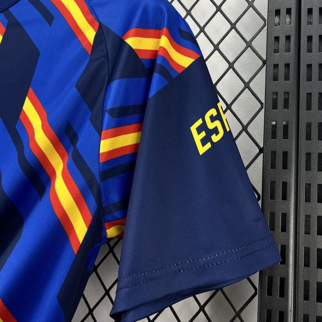 Leazofoot Spain pre-match football jersey with blue, red, and yellow stripes and "ESP" text on the sleeve.