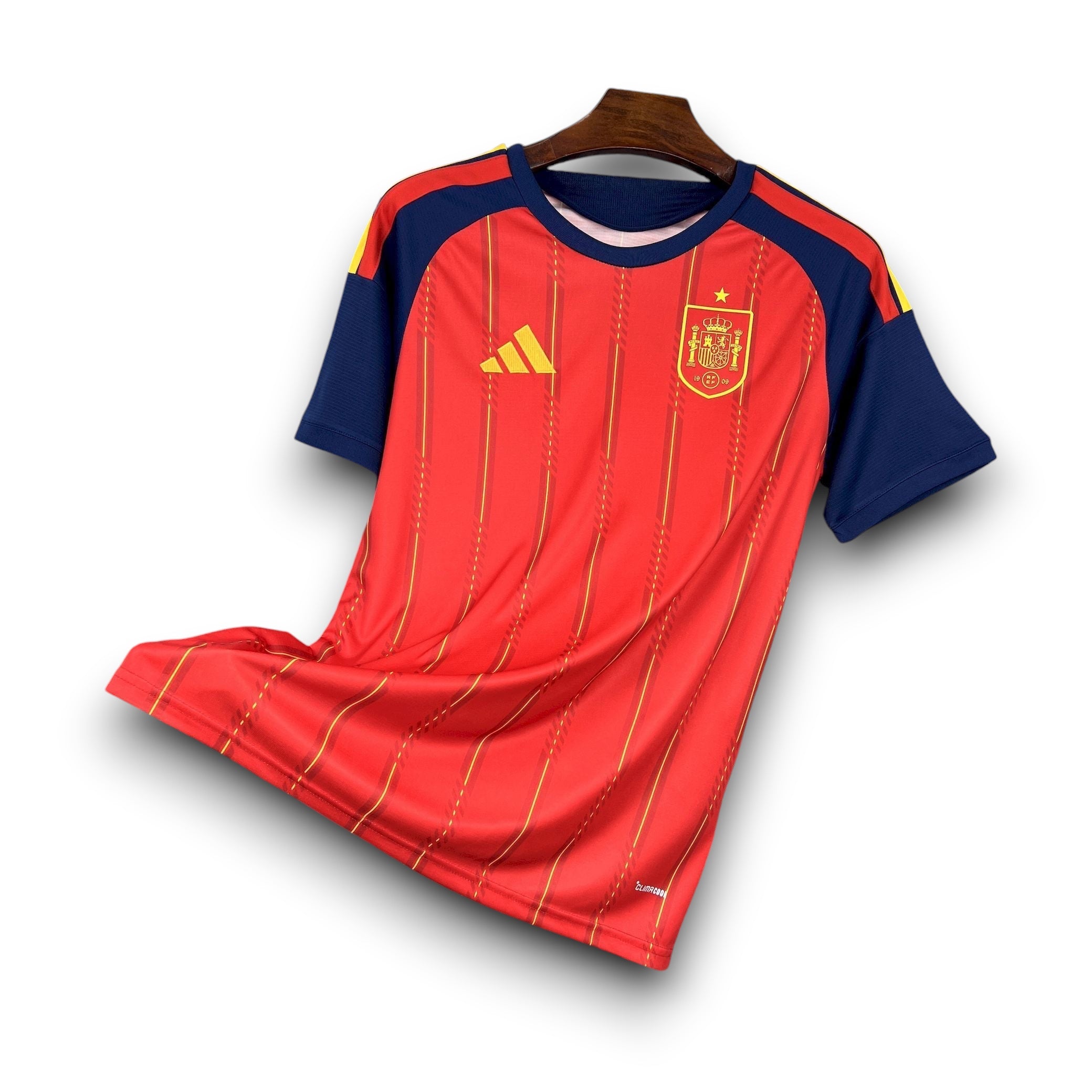 Leazofoot Spain 2026 home soccer jersey, red with yellow pinstripes and navy blue sleeves.