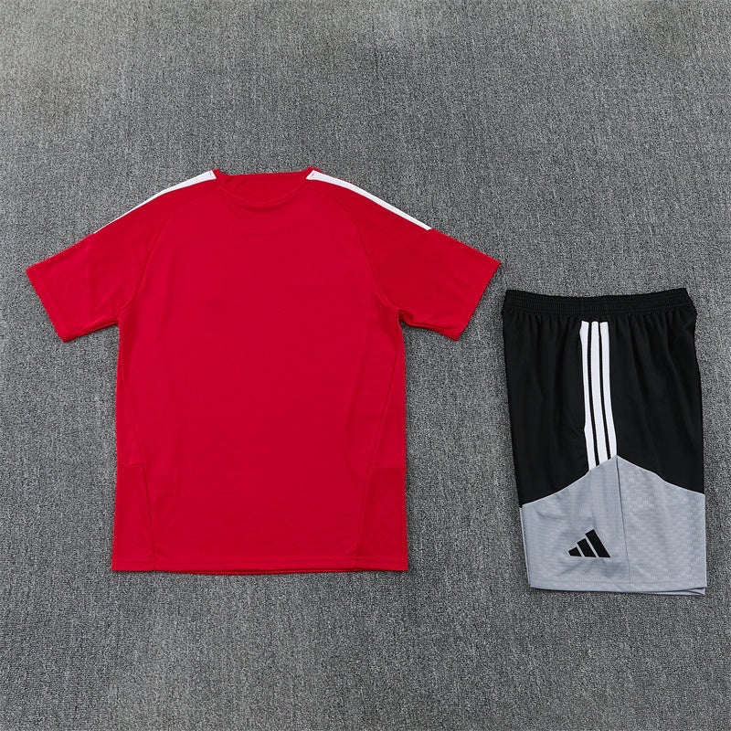 Leazofoot Spain 2026 training set featuring a red short-sleeve jersey and black and grey shorts with white stripes.