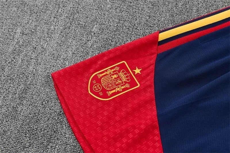 Leazofoot Spain 2026 training shorts in red and navy blue with yellow stripes and the Spanish national team crest