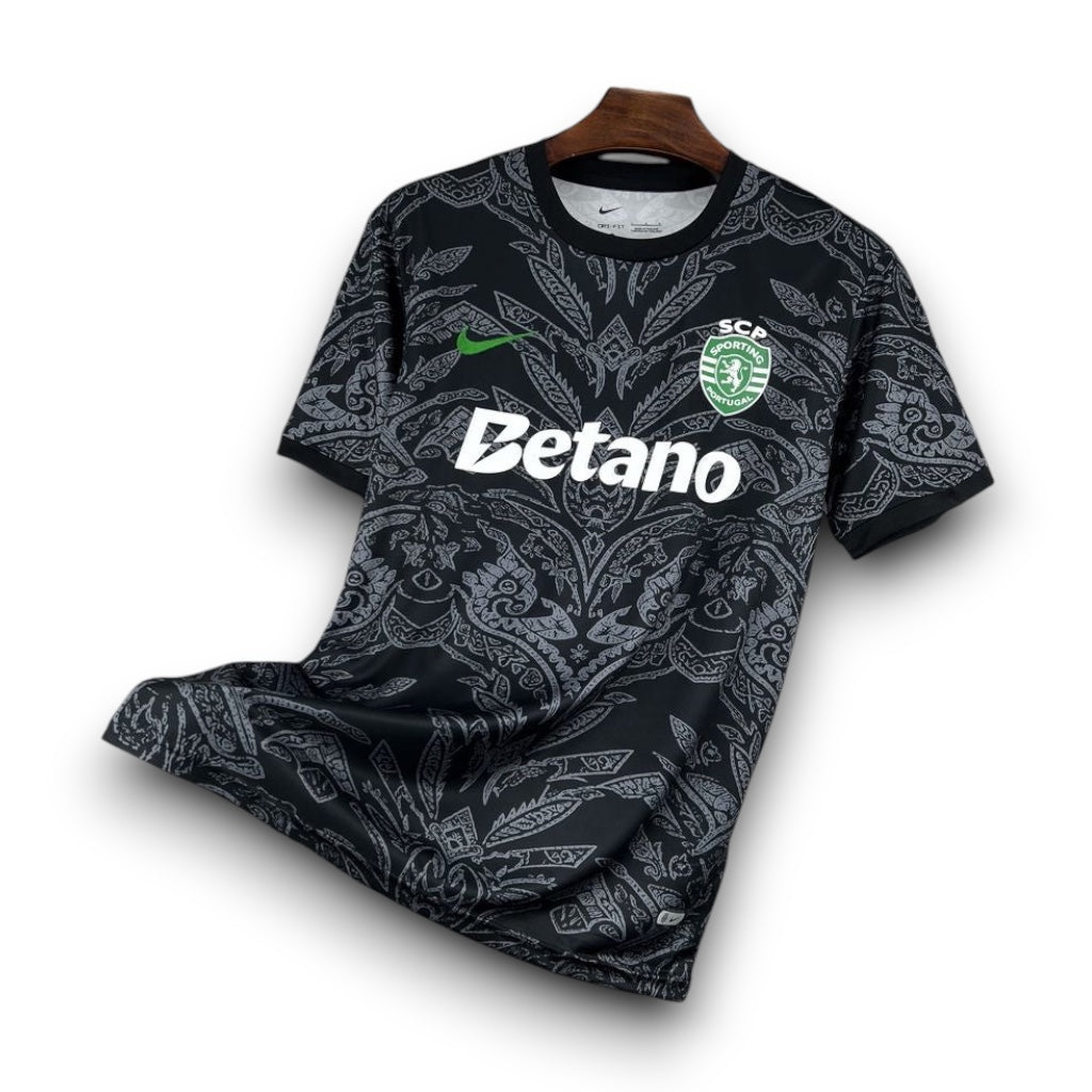 Leazofoot Sporting CP 25/26 goalkeeper jersey in black with intricate grey patterned design and green accents.
