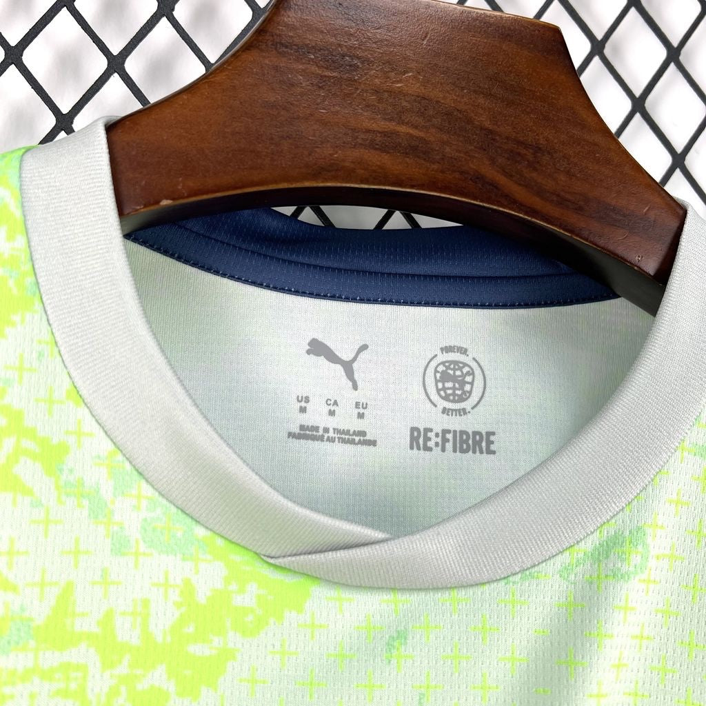 Leazofoot Switzerland 2026 away jersey featuring a light green and white cross pattern with RE:FIBRE sustainable fabric