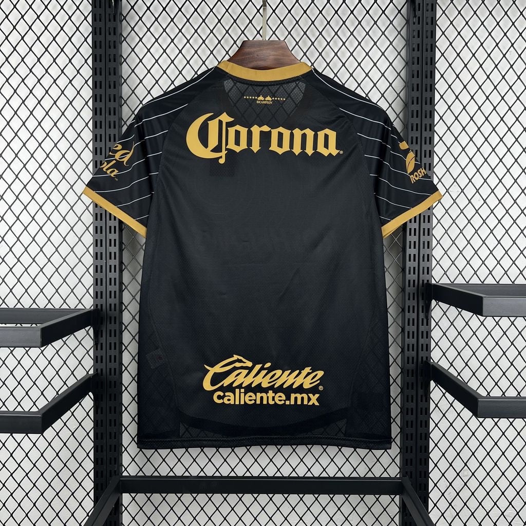 Leazofoot Toluca 26/27 concept soccer jersey in black with gold sponsor logos and pinstripe sleeve details.