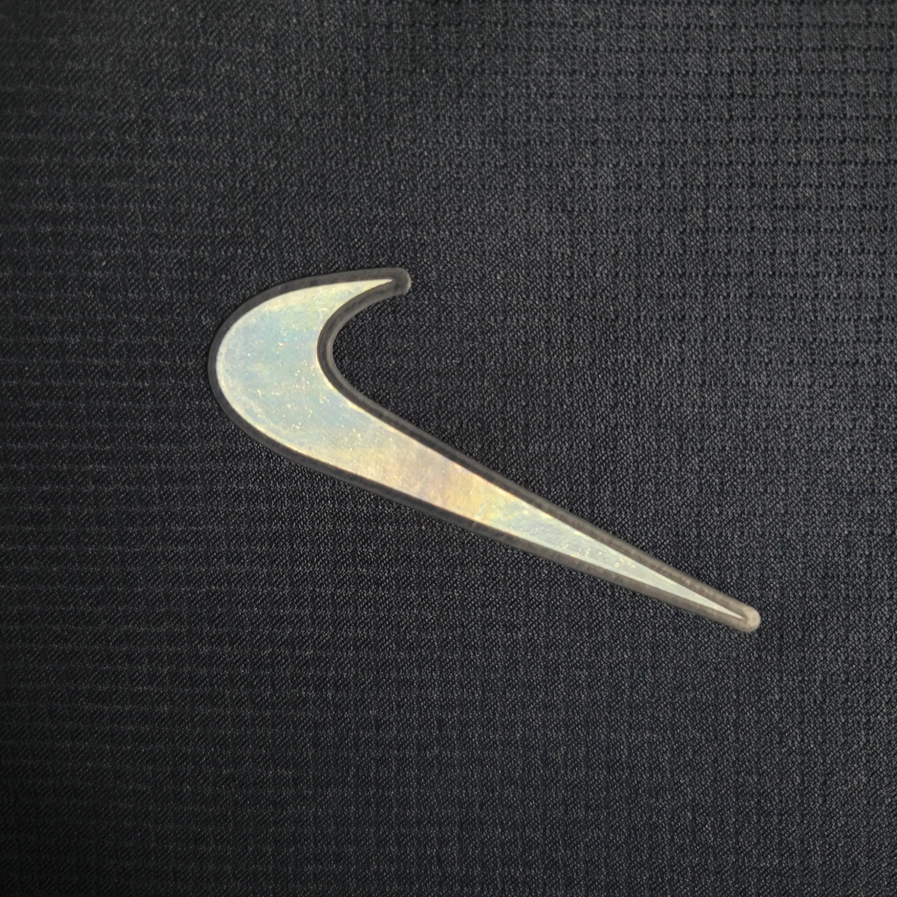 Leazofoot Tottenham 23/24 away jersey with iridescent Nike logo on black fabric.