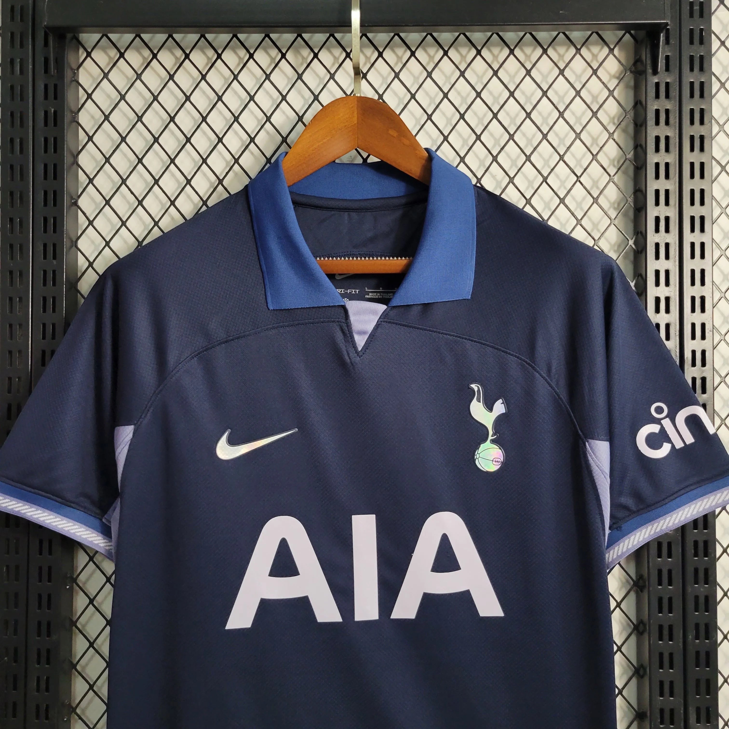Leazofoot Tottenham Hotspur 23/24 dark blue football jersey with AIA logo and Nike swoosh.
