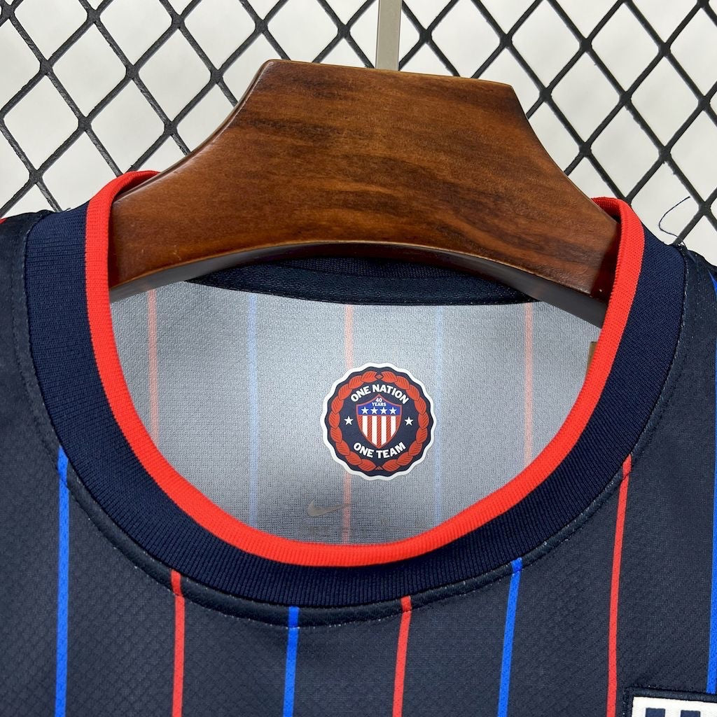 Leazofoot USA 2025 away soccer jersey in navy with red and blue vertical stripes and One Nation One Team inner neck logo