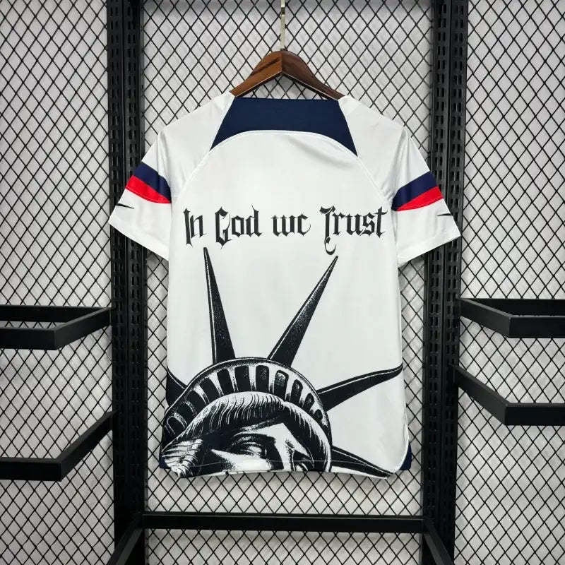 Leazofoot USA 2025 concept soccer jersey featuring Statue of Liberty graphic and In God We Trust text in white.