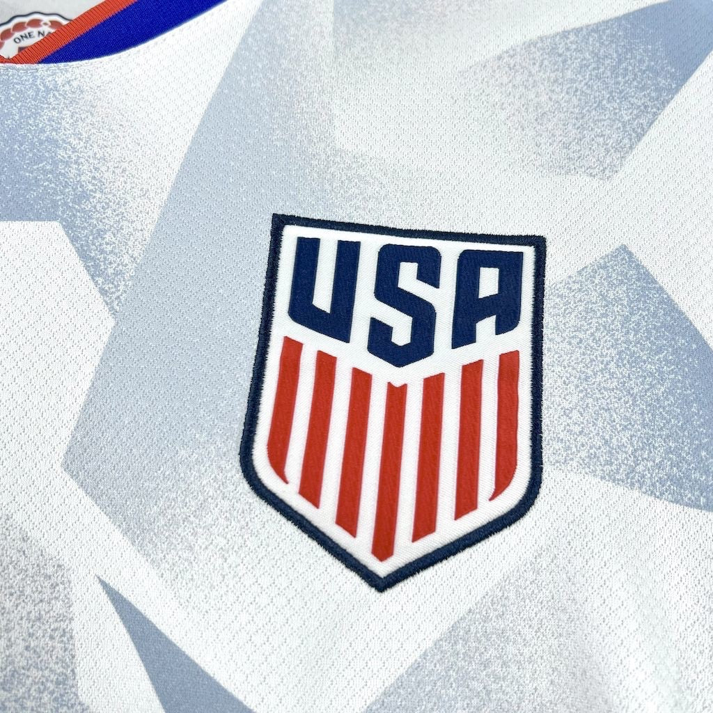 Leazofoot 2025 USA home soccer jersey featuring a white fabric with a subtle grey star pattern and embroidered crest.