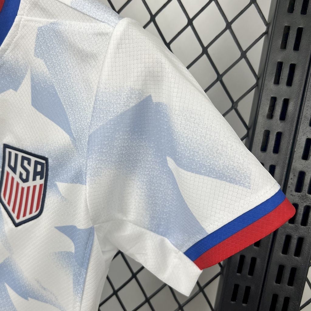 Leazofoot USA 2025 home kids soccer jersey in white with blue star pattern and red and blue sleeve trim details.