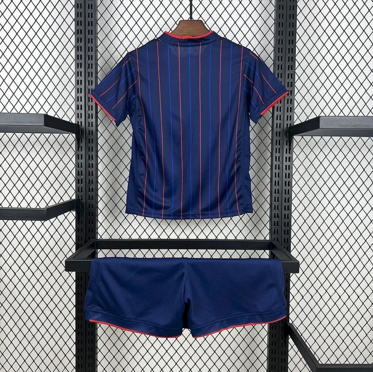 Leazofoot 2025 USA kids outdoor soccer kit in navy blue with red and blue vertical pinstripes and red trim.