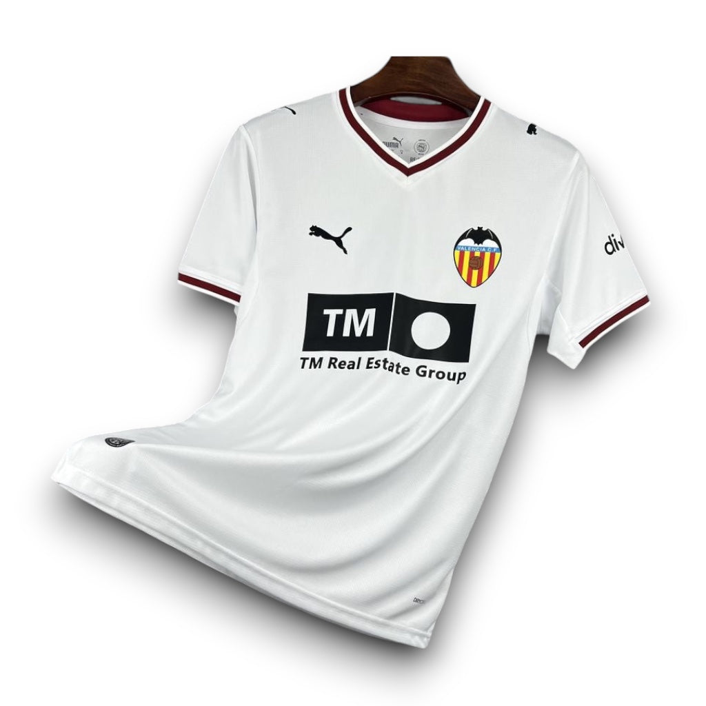 Leazofoot Valencia CF 26/27 home jersey in white with maroon trim, featuring team crest and sponsor logos.